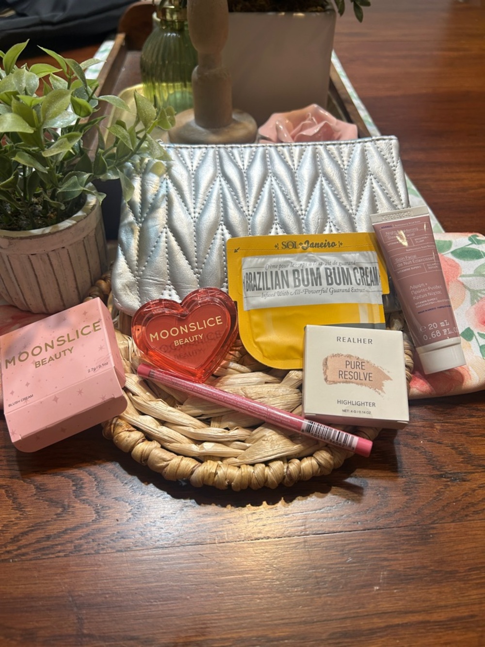 Silver Quilted Cosmetic Pouch with Assorted Beauty Items